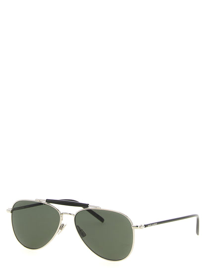 This Sunglasses by Saint Laurent for men in nylon silicone & acetate silver & signature presents a sumptuous silhouette, showcasing a sumptuous aviator frame design in silver coloured frame and high-performance .