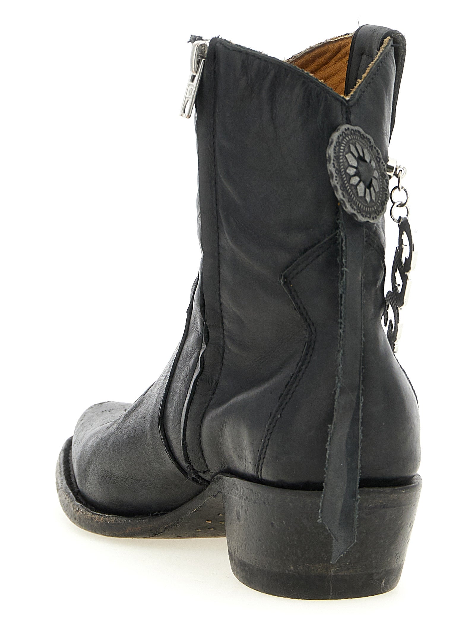Ankle Chelsea Boots by Comme Des Garçons for women in cowhide leather black features an effortless chic silhouette from the Women's Cowhide Leather Ankle Chelsea Boots collection, showcasing a effortless chic and refined for an effortless chic look.