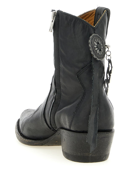 Ankle Chelsea Boots by Comme Des Garçons for women in cowhide leather black features an effortless chic silhouette from the Women's Cowhide Leather Ankle Chelsea Boots collection, showcasing a effortless chic and refined for an effortless chic look.
