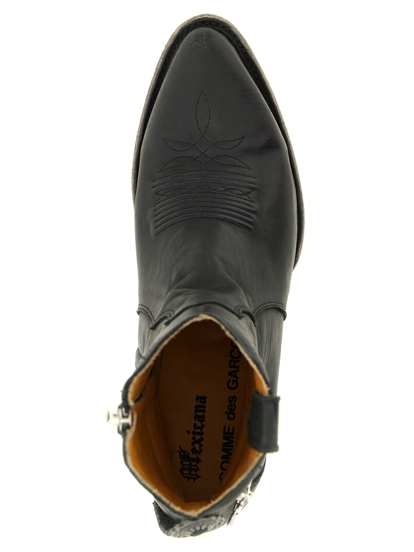 Ankle Chelsea Boots by Comme Des Garçons for women in cowhide leather black features an avant-garde Women's Cowhide Leather Ankle Chelsea Boots silhouette, defined by a sophisticated and a avant-garde .