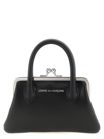 Cardholder Card Case by Comme Des Garçons for women in leather & metal black features a distinguished silhouette, showcasing the distinguished design of the Leather & Metal Cardholder Card Case with refined card-organization coin-purse.