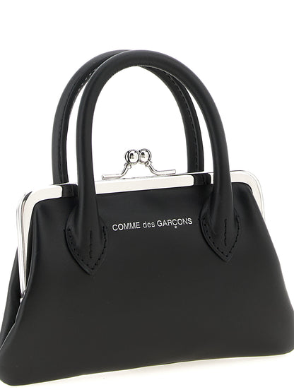 Cardholder Card Case by Comme Des Garçons for women in leather & metal black features a refined silhouette, showcasing the elegant lines of the Leather & Metal Cardholder Card Case alongside premium card-organization coin-purse for a refined finish.