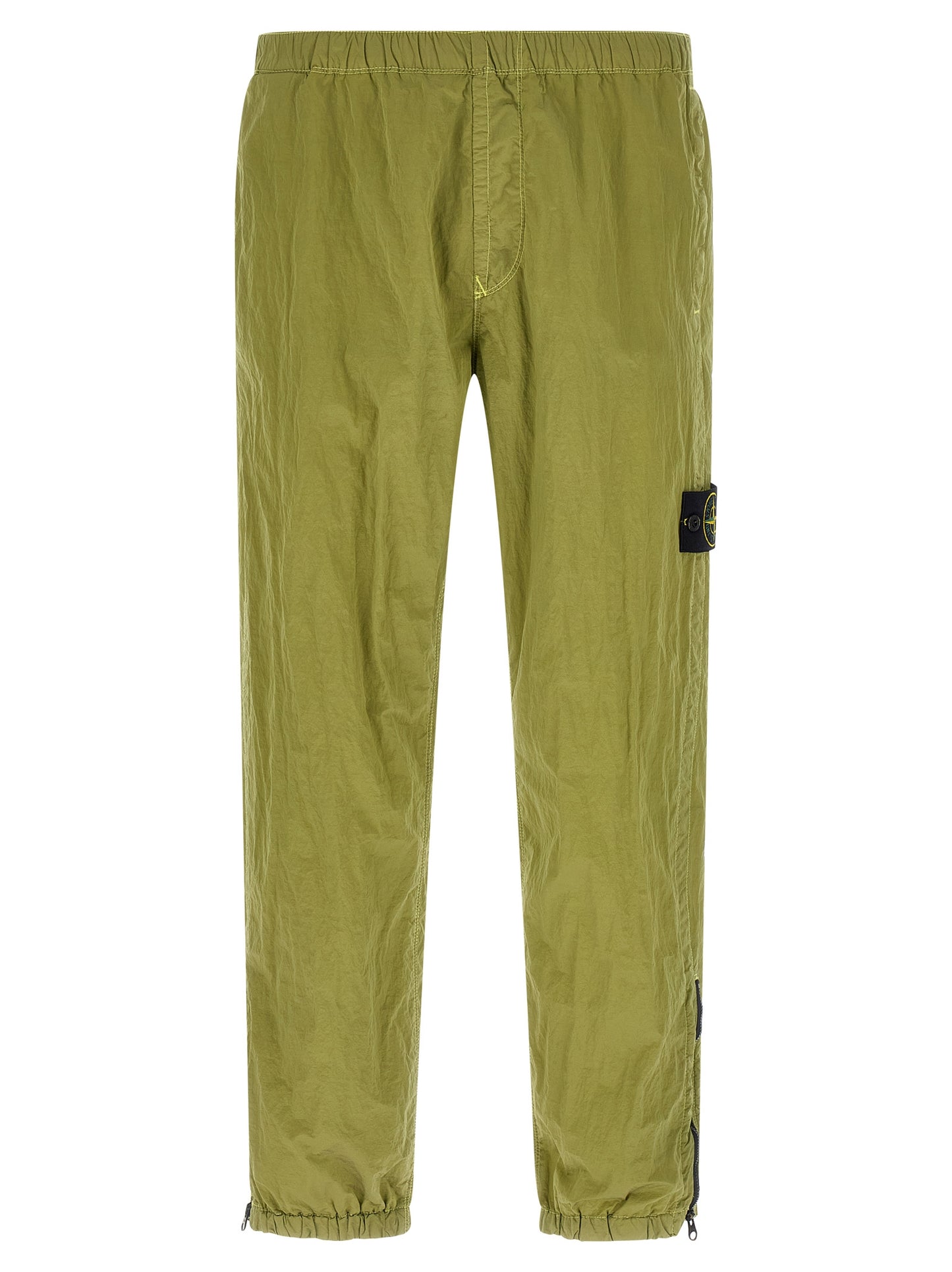 Joggers by Stone Island for men in nylon bicolour & green features an sartorial tapered-leg and long with a cut for a sartorial finish.