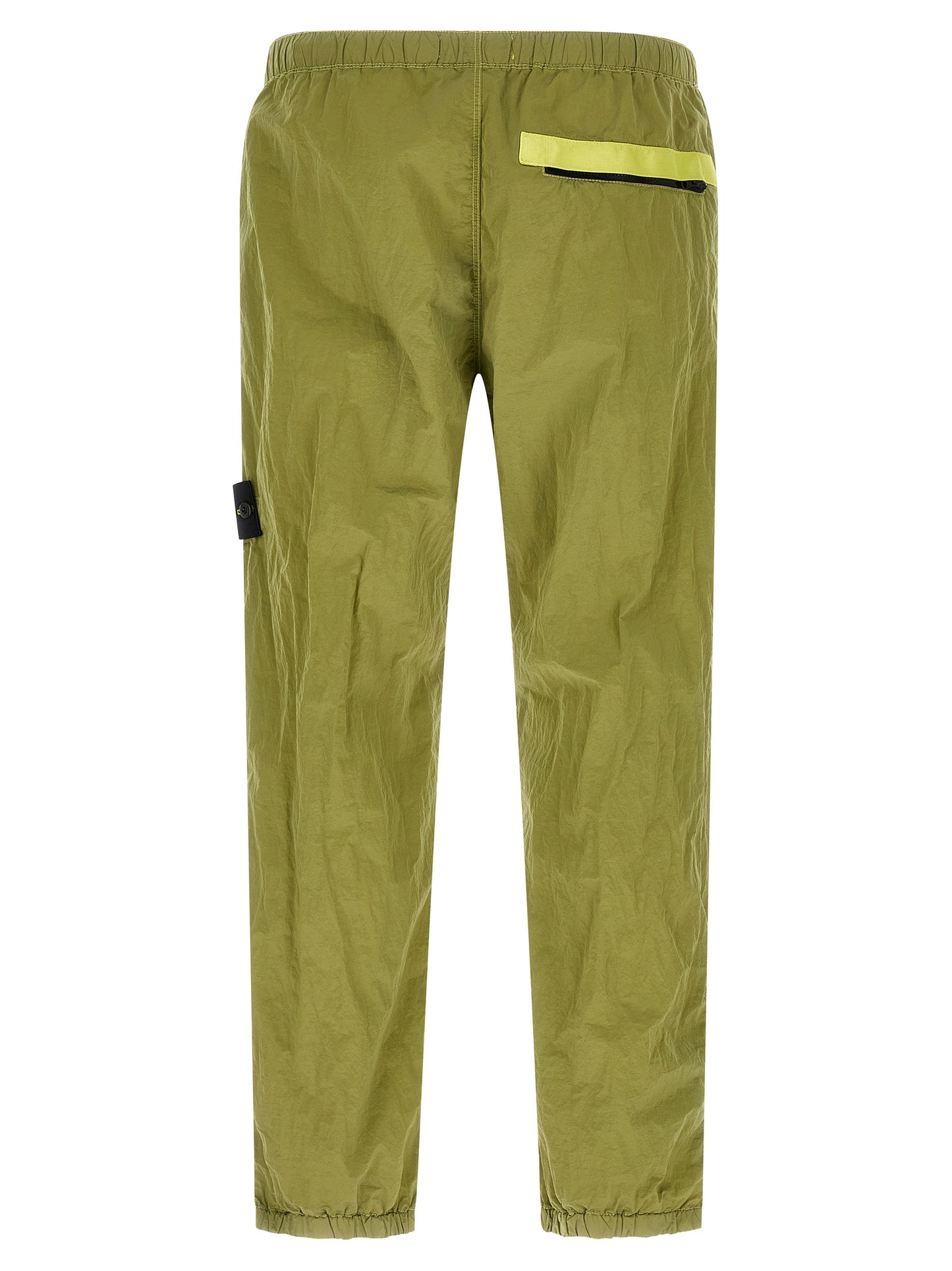 Joggers by Stone Island for men in nylon bicolour & green features an sophisticated and tapered-leg with a precise long, creating a sophisticated and sophisticated silhouette.