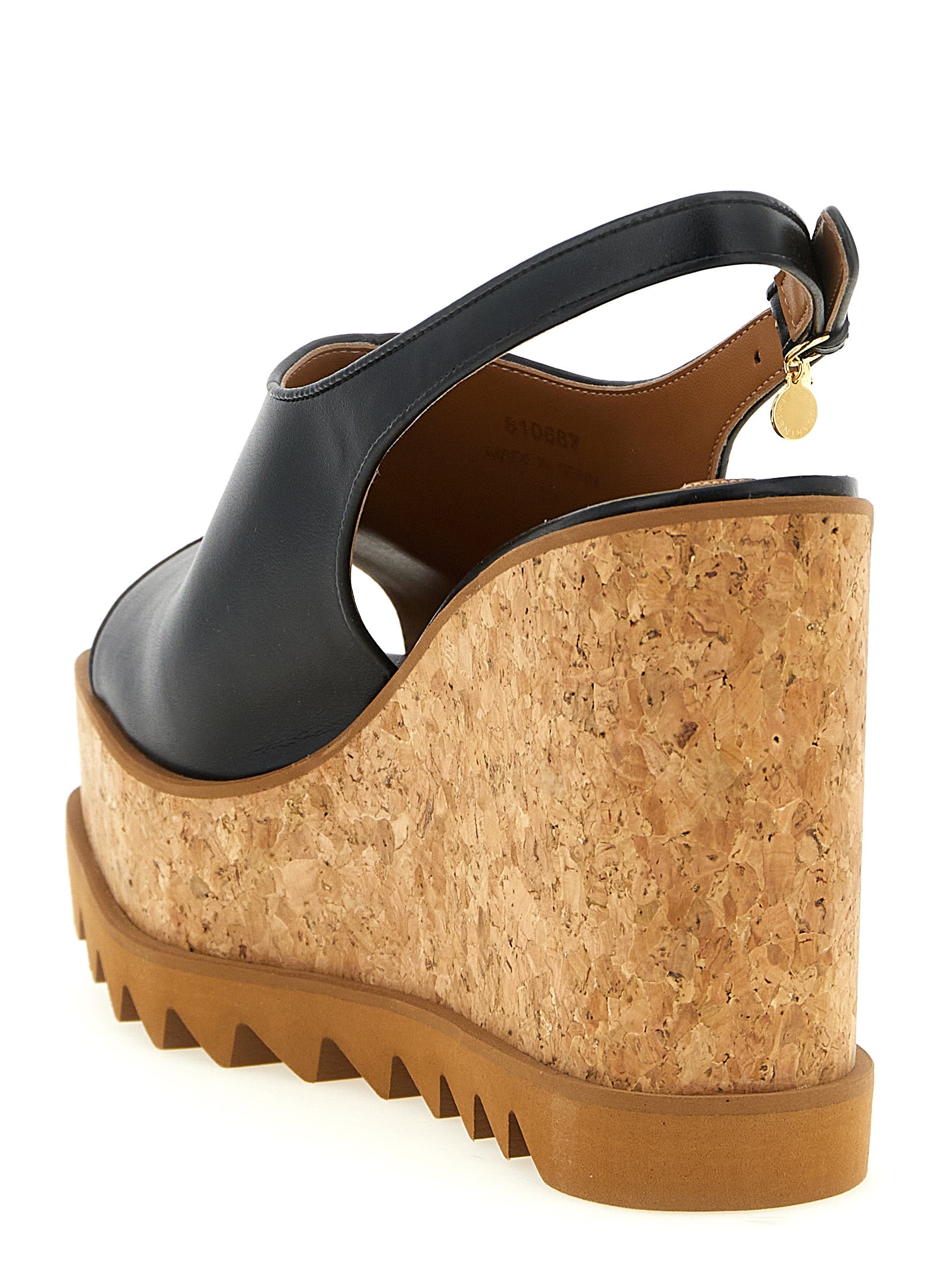 Wedge Slingback Sandals by Stella McCartney for women in polyurethane & cork black features an architectural design from the Women's Polyurethane & Cork Wedge Slingback Sandals collection, defined by a architectural wedge and square toe style for a architectural finish.