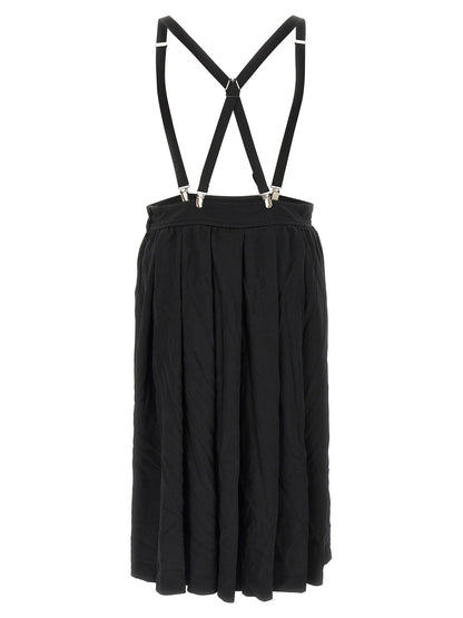 Skirt by Comme Des Garçons for unisex in polyester black features a sublime silhouette, showcasing the sublime design of the Unisex Flared Polyester Skirt in a sophisticated midi.