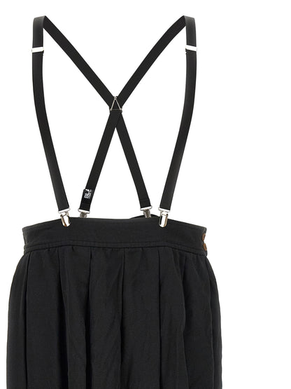 Skirt by Comme Des Garçons for unisex in polyester black showcases a sultry silhouette, elegantly defined by its midi and the sophisticated sultry design of the Unisex Flared Polyester Skirt.