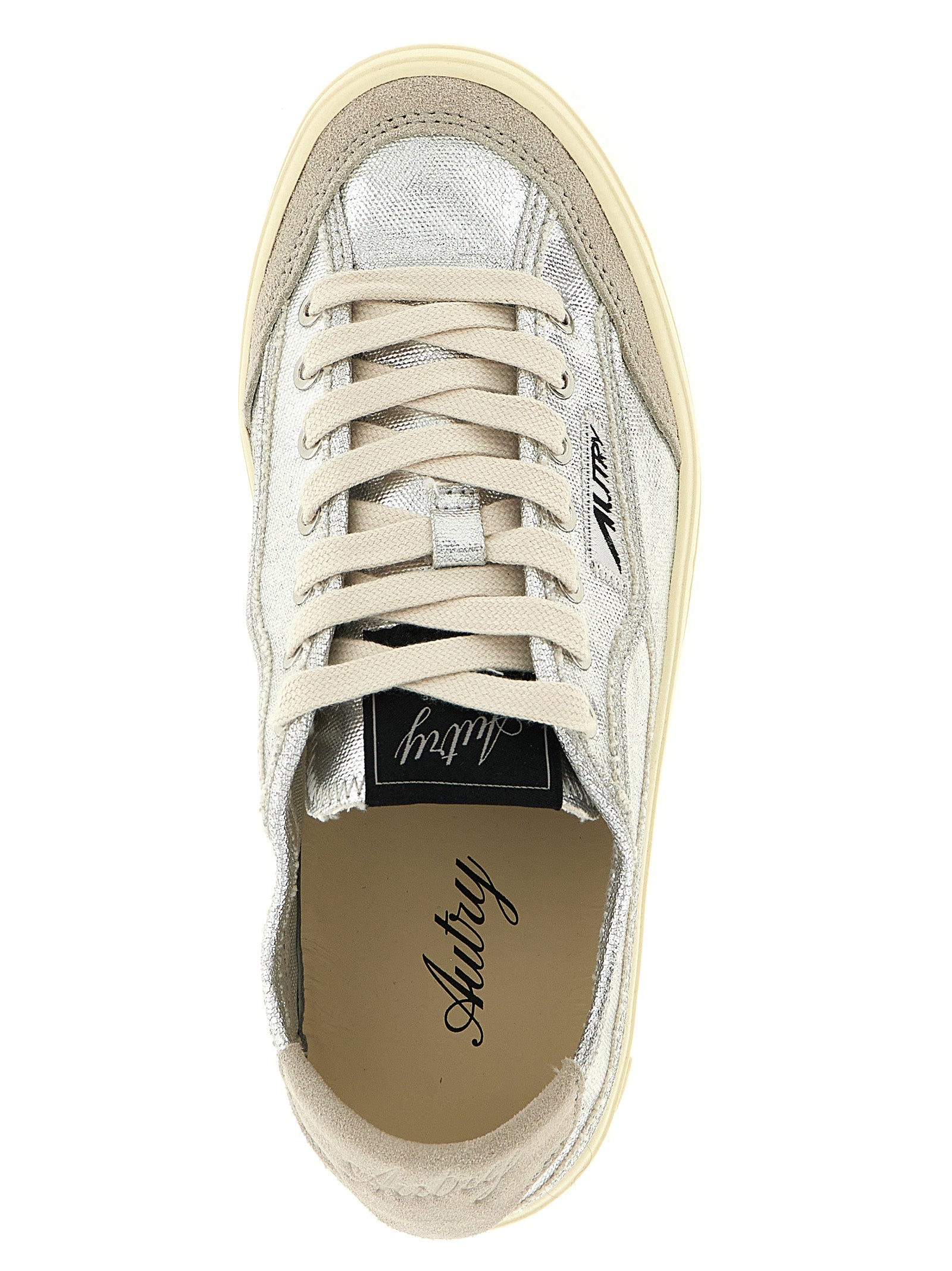 Sneakers by Autry for women in suede leather & canvas silver features a chic design, perfectly showcasing the chic low-top style of this Women's Low Top Suede Leather & Canvas Sneakers.