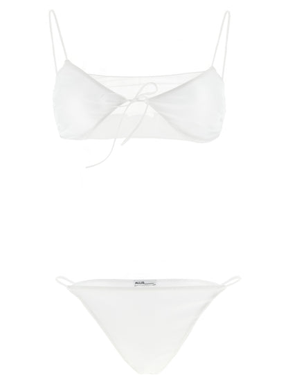 This Bikini by ALLIS for women in stretch polyester & silk transparent & white features a beach chic silhouette from the Women's Stretch Polyester & Silk Bikini collection, showcasing a beach chic cut for a refined poolside look.