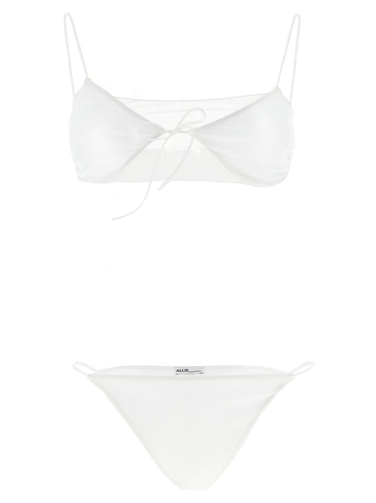 This Bikini by ALLIS for women in stretch polyester & silk transparent & white features a beach chic silhouette from the Women's Stretch Polyester & Silk Bikini collection, showcasing a beach chic cut for a refined poolside look.