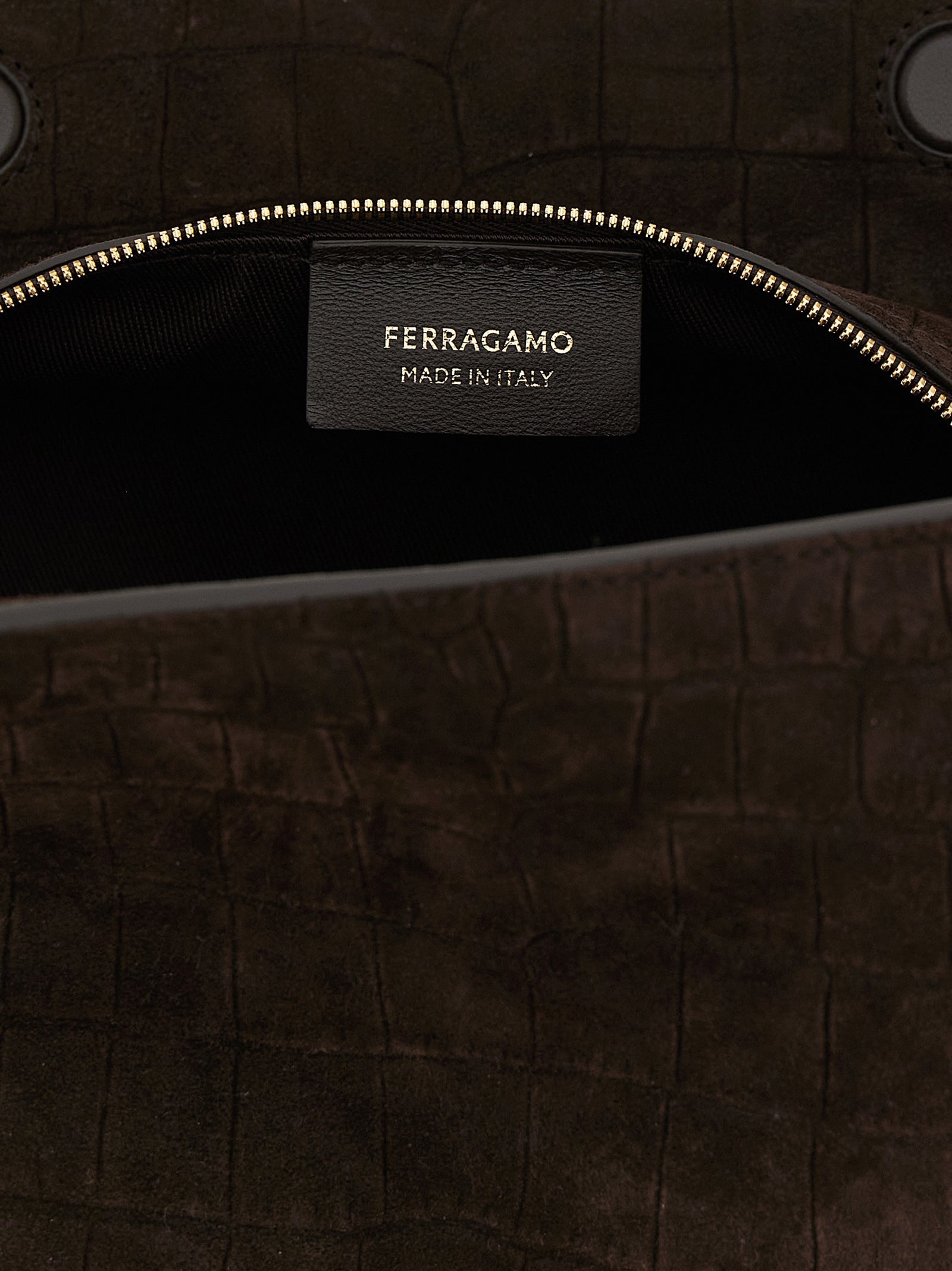 Shoulder Bag by Ferragamo for women in suede exotic leather brown features a enviable silhouette, showcasing a secure zipper & magnetic, ample , and enviable shoulder-strap & handle for a enviable finish.