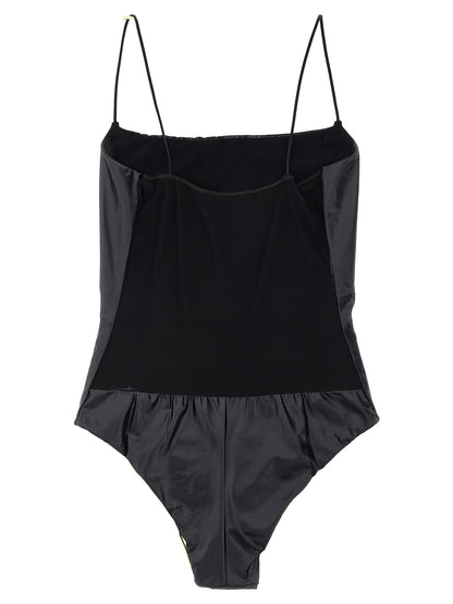 One-Piece Swimsuit by ALLIS for women in stretch polyester satin black & transparent features a contemporary silhouette, showcasing the contemporary cut of this Waves Women's Stretch Polyester Satin One-Piece Swimsuit for a sophisticated, contemporary beachwear aesthetic.