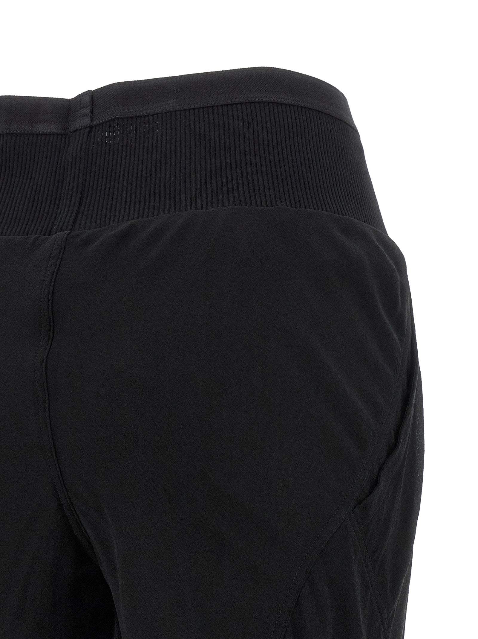 Trousers by Rick Owens for women in silk black & transparent features a artisanal silhouette, showcasing a sophisticated flared with a long and for a artisanal finish.