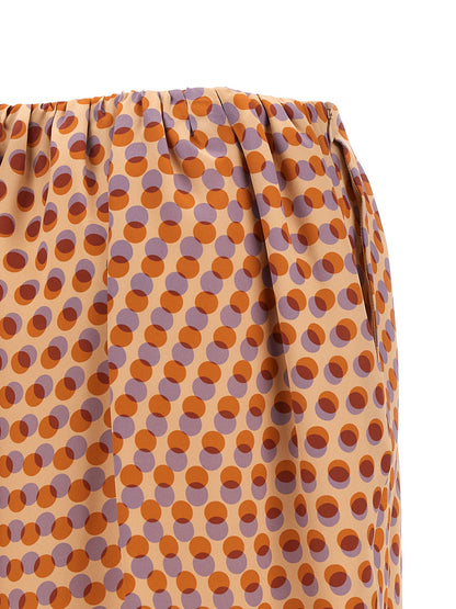 Skirt by Dries Van Noten for women in silk multicolor & patterned features an relaxed-yet-refined silhouette that elegantly showcases the Women's Asymmetrical Silk Skirt design and sophisticated midi.