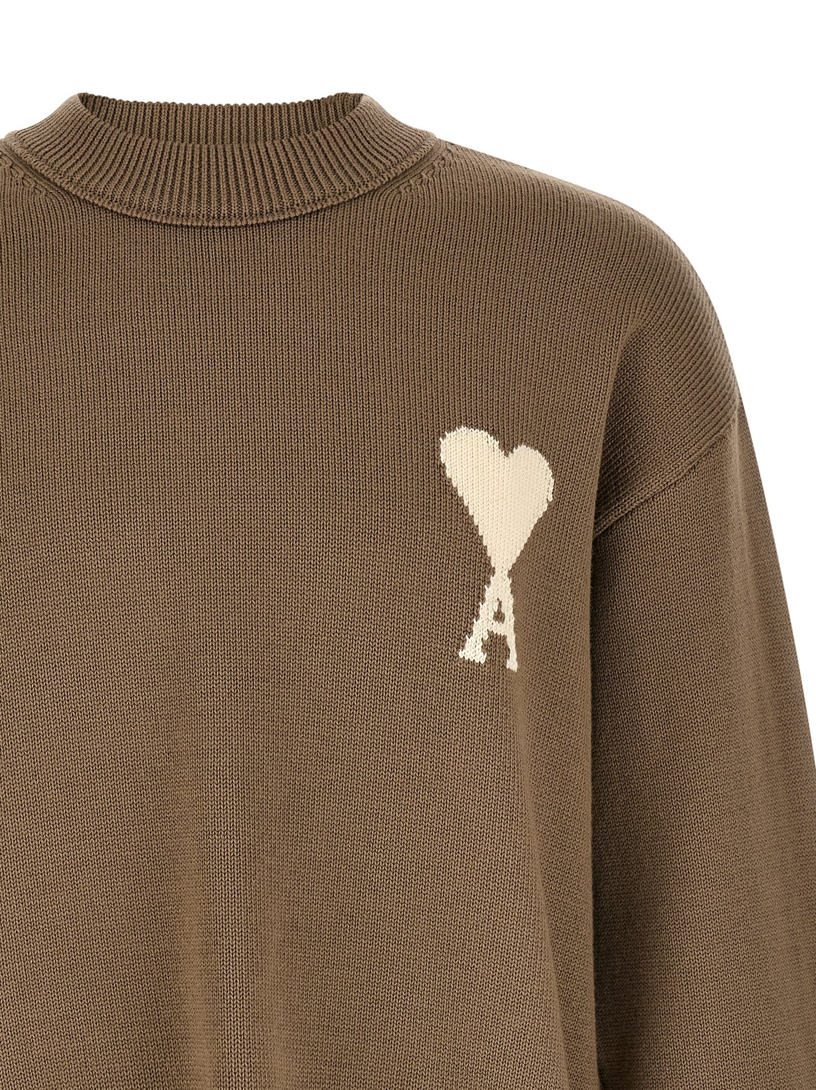 Cardigan by Ami Paris for men in wool cotton beige showcases a luxurious silhouette, meticulously detailed with a sophisticated crew neckline and for a refined finish.