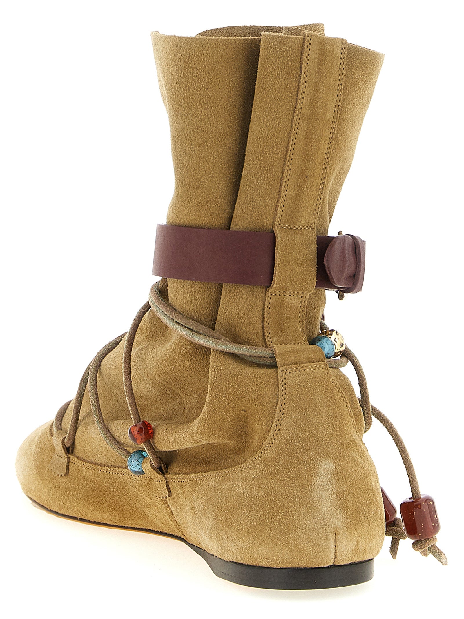 Flat Ankle Strap Boots by Isabel Marant for women in resin & suede calfskin leather beige features an enchanting design from the Women's Resin & Suede Calfskin Leather Flat Ankle Strap Boots collection, highlighting a enchanting flat and for a refined look.