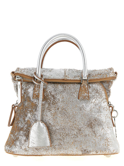 Mini Handbag by Maison Margiela for women in lamb leather silver features an refined silhouette, showcasing a secure zipper, ample , and versatile shoulder-strap, adjustable-strap & handle for a sophisticated refined aesthetic.