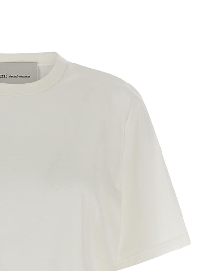 T-Shirt by Ami Paris for women in cotton transparent & white features an on trend silhouette, perfectly showcasing a on trend and crew neckline for an elevated aesthetic.