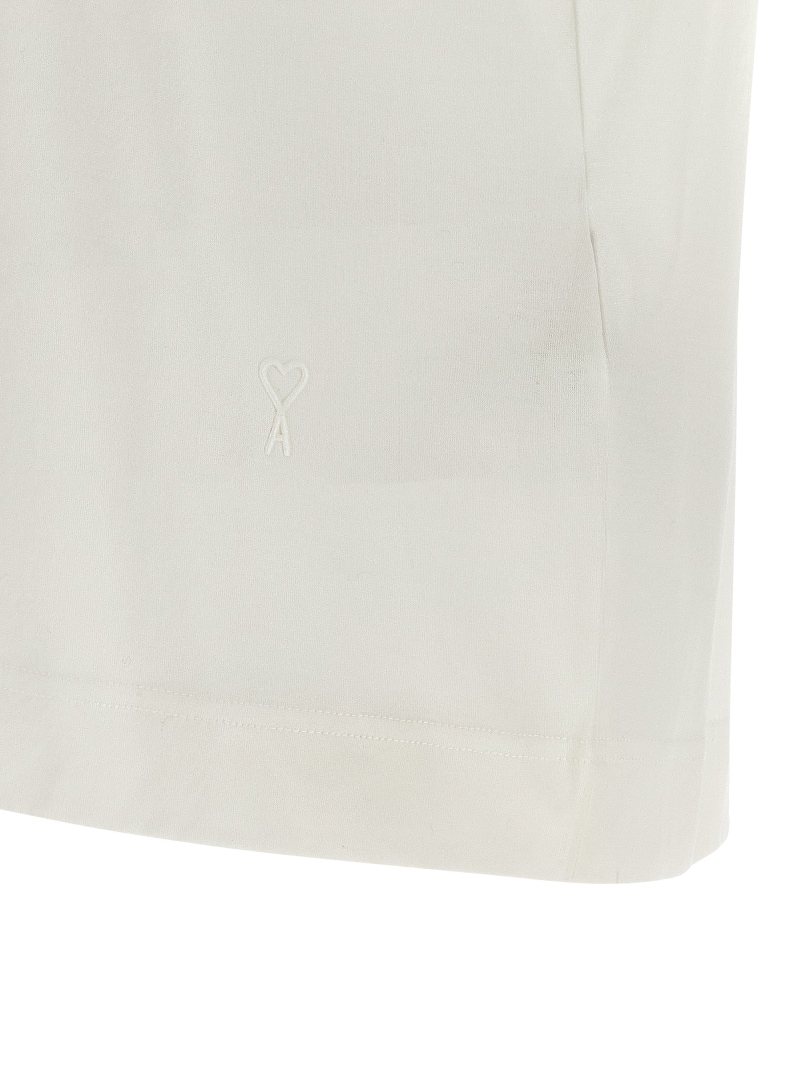 T-Shirt by Ami Paris for women in cotton transparent & white showcases a fashionable silhouette, elegantly detailed with a fashionable and for a sophisticated, high-fashion look.