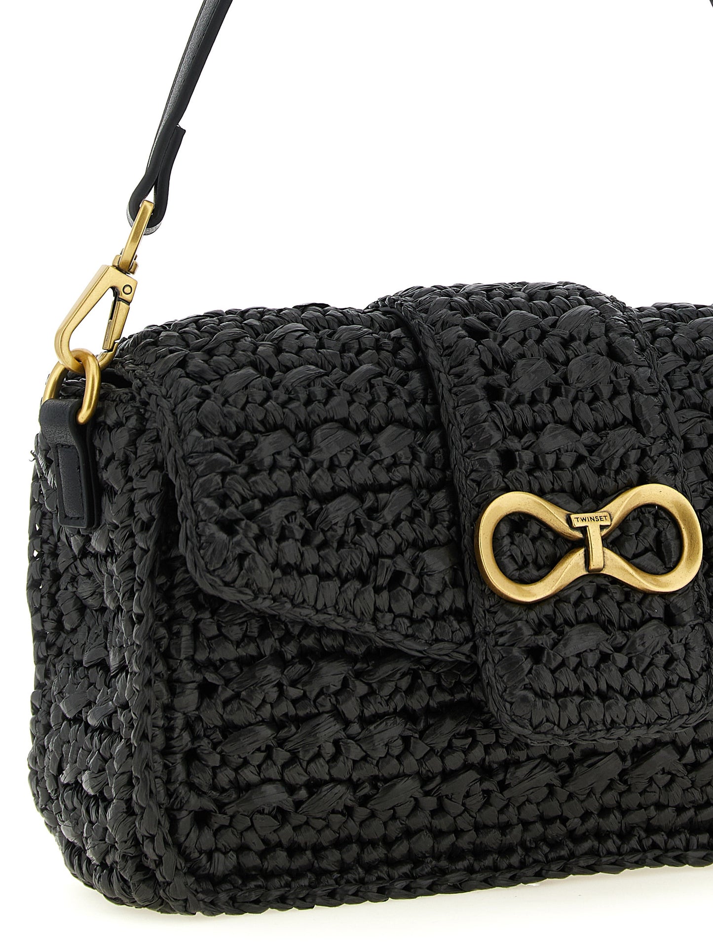 Crossbody Flap Handbag by Twinset for women in raffia cellulose & polypropylene faux leather black showcases a versatile sophistication silhouette, featuring a secure flap & magnetic, versatile sophistication , and versatile crossbody-strap, shoulder-strap, detachable-strap & handle for a versatile sophistication finish.