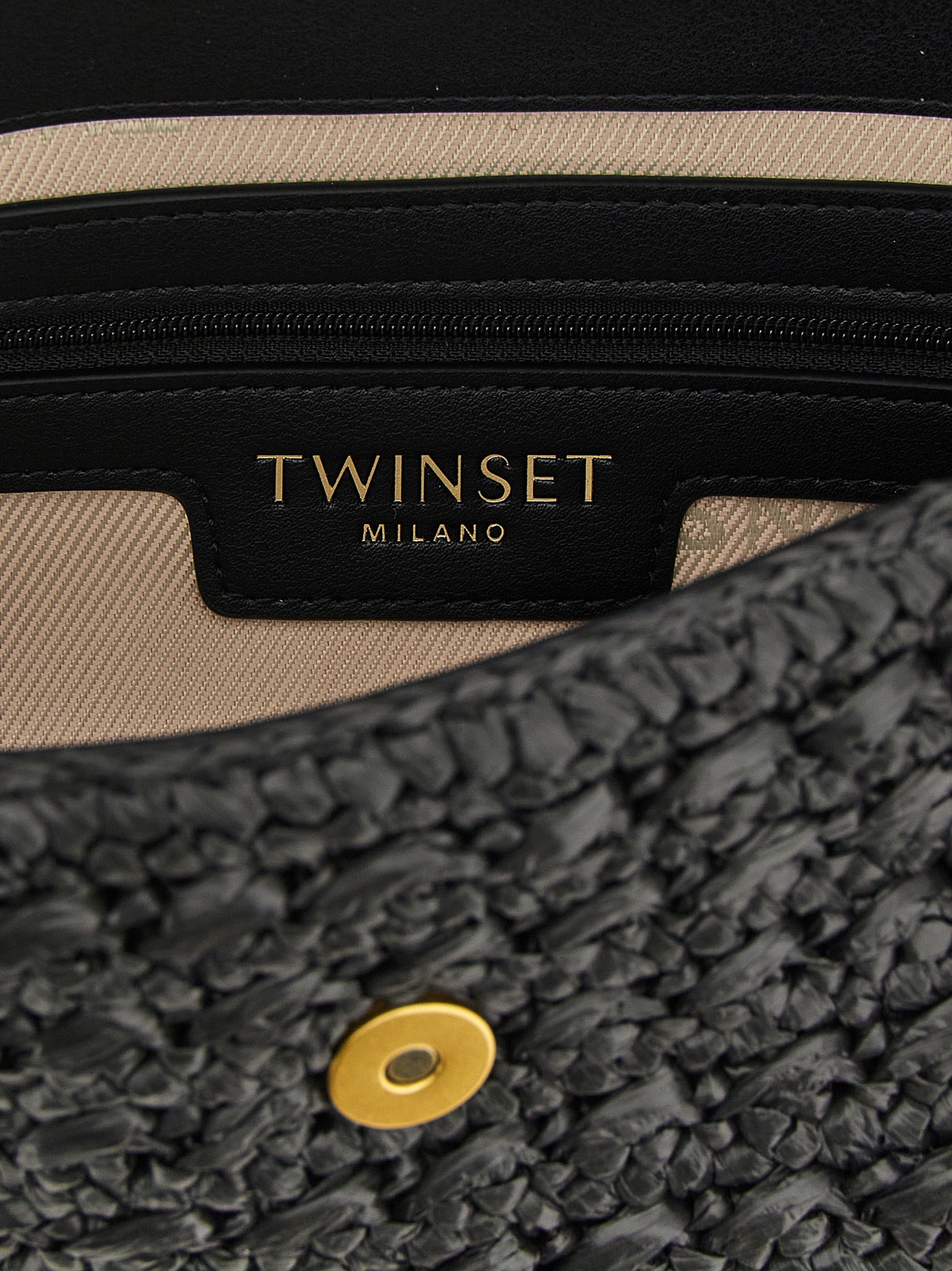 Crossbody Flap Handbag by Twinset for women in raffia cellulose & polypropylene faux leather black features a transformative sophistication silhouette, showcasing a secure flap & magnetic, ample , and versatile crossbody-strap, shoulder-strap, detachable-strap & handle for a transformative sophistication look.