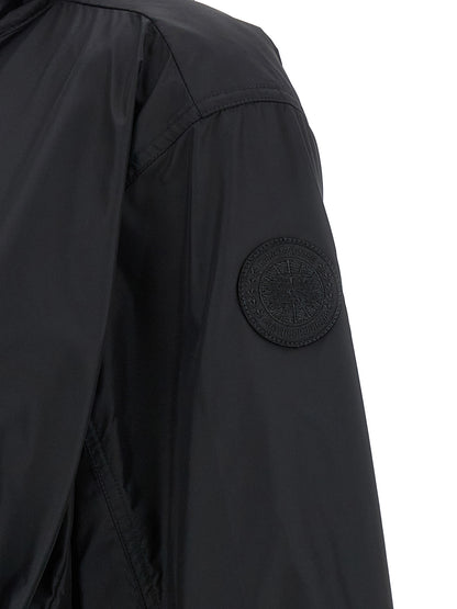 Hooded Parka by Canada Goose for women in polyamide black, presenting a cosy silhouette with distinctive windproof, pockets & hooded and a refined .