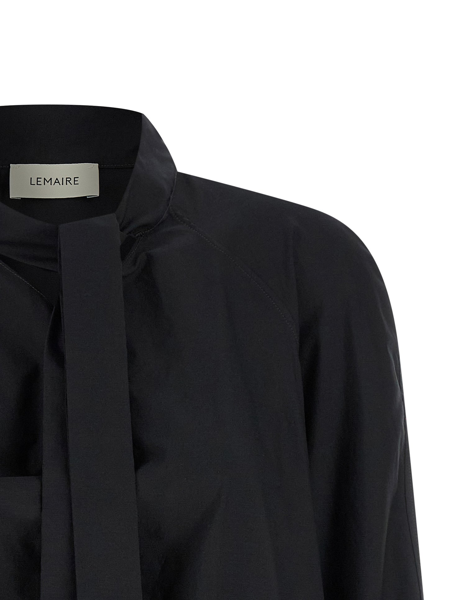 Blouse by Lemaire for women in cotton & silk black showcases a sharp silhouette, elegantly detailed with a sharp round neckline and sharp .