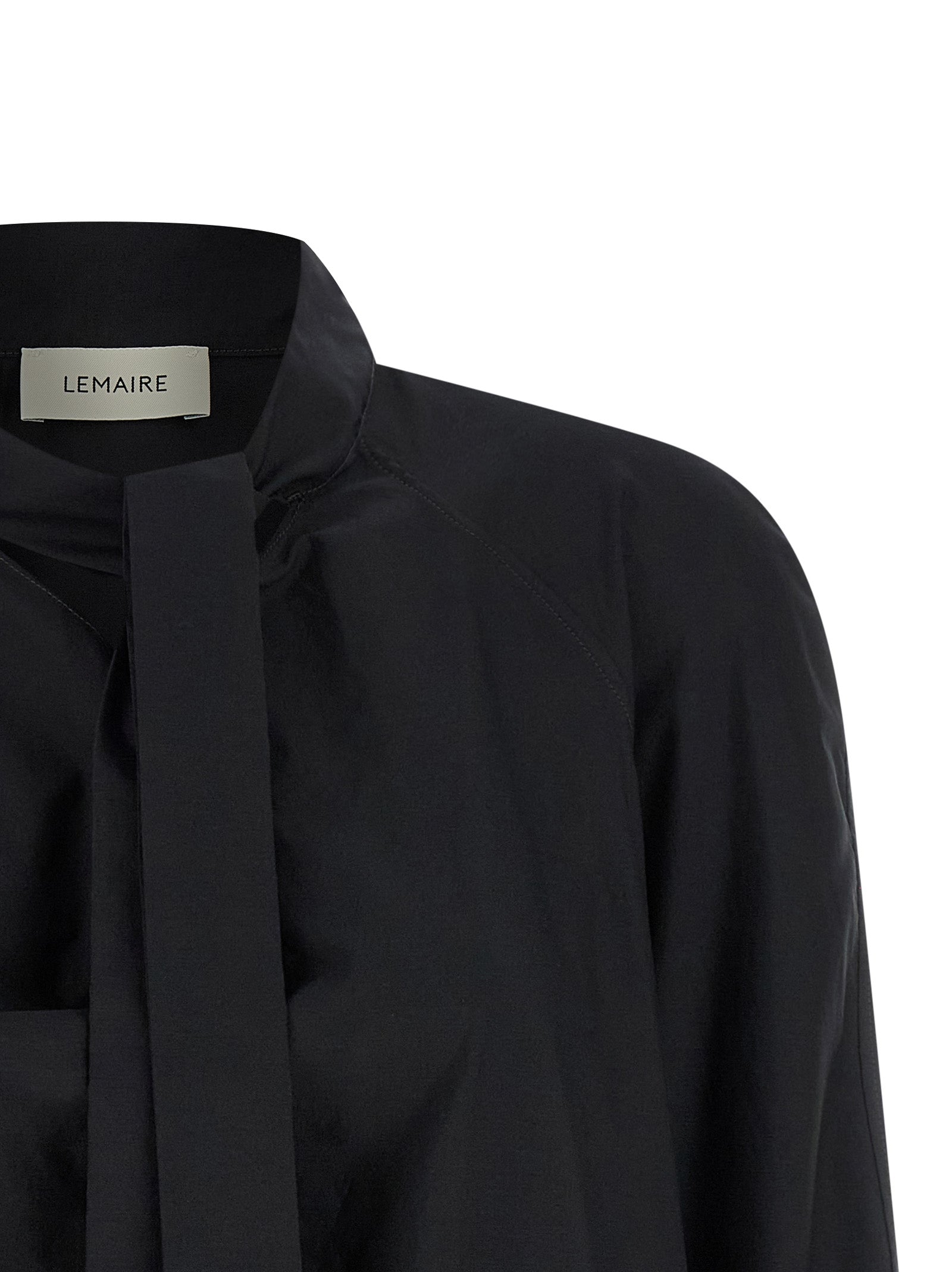 Blouse by Lemaire for women in cotton & silk black showcases a sharp silhouette, elegantly detailed with a sharp round neckline and sharp .