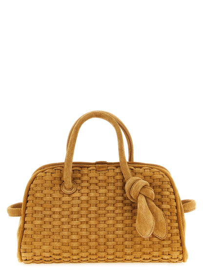 Bowling Handbag by Jacquemus for women in calfskin leather beige & natural features an refined silhouette, showcasing a secure zipper, ample , and versatile shoulder-strap, adjustable-strap & handle for a sophisticated refined aesthetic.