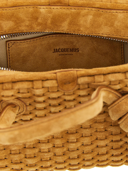 Bowling Handbag by Jacquemus for women in calfskin leather beige & natural presents a ornamental silhouette, showcasing a secure zipper, ample , and versatile shoulder-strap, adjustable-strap & handle for a ornamental finish.