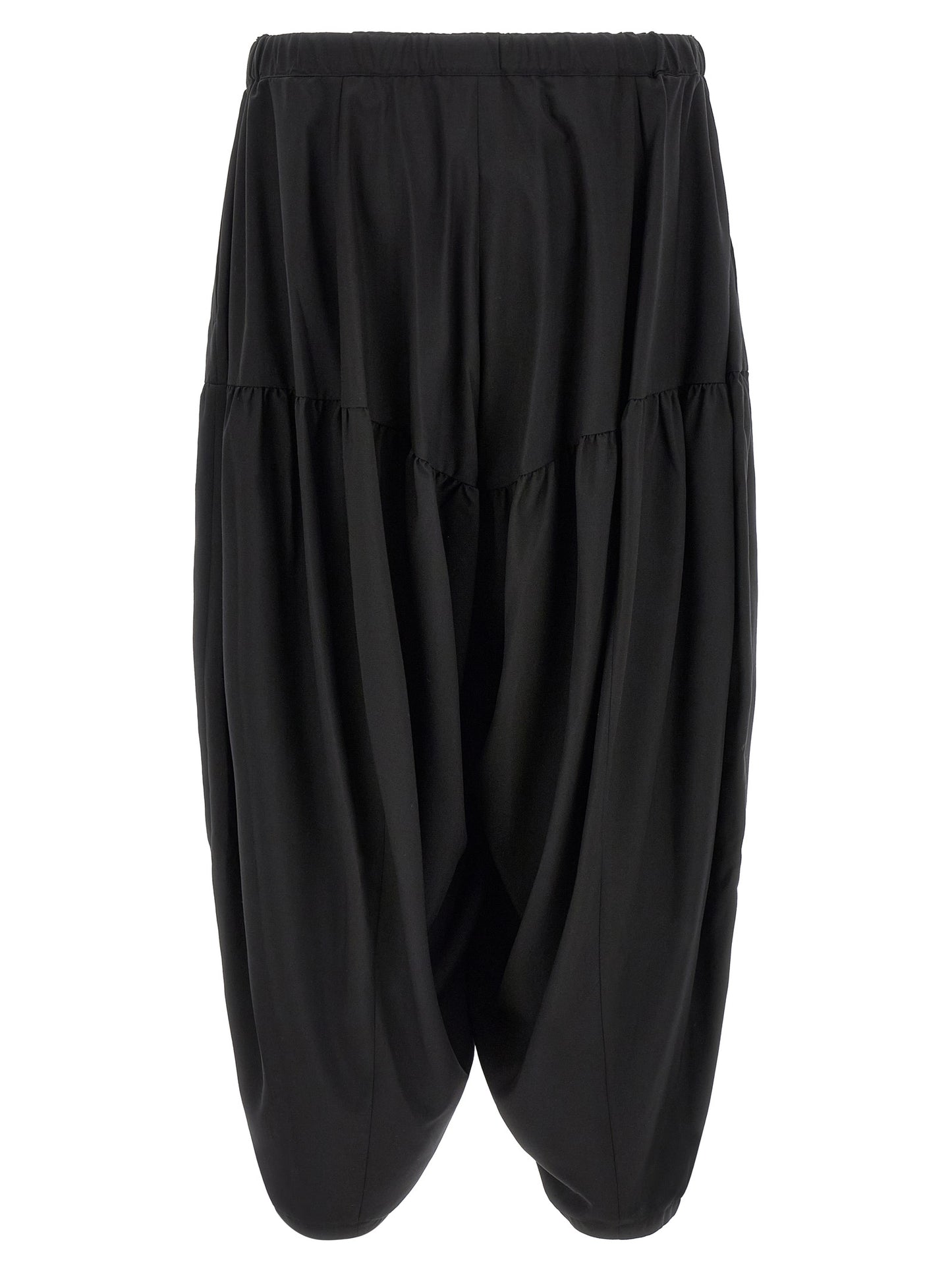 Trousers by Comme Des Garçons for men in polyester black features a sculptural silhouette, showcasing a sculptural and long with a sophisticated for a sculptural finish.