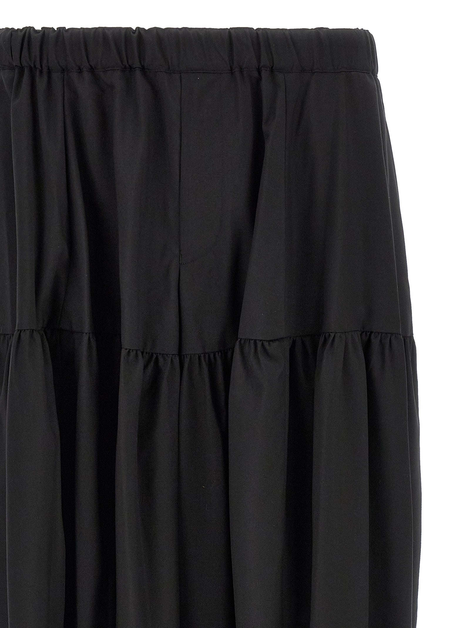 Trousers by Comme Des Garçons for men in polyester black presents a perennial silhouette, meticulously tailored with a cut, long finish, and an elegant .