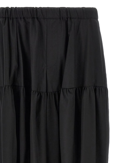 Trousers by Comme Des Garçons for men in polyester black presents a perennial silhouette, meticulously tailored with a cut, long finish, and an elegant .