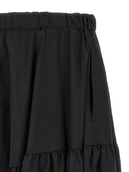 Trousers by Comme Des Garçons for men in polyester black features a artisanal silhouette, showcasing a sophisticated with a long and for a artisanal finish.