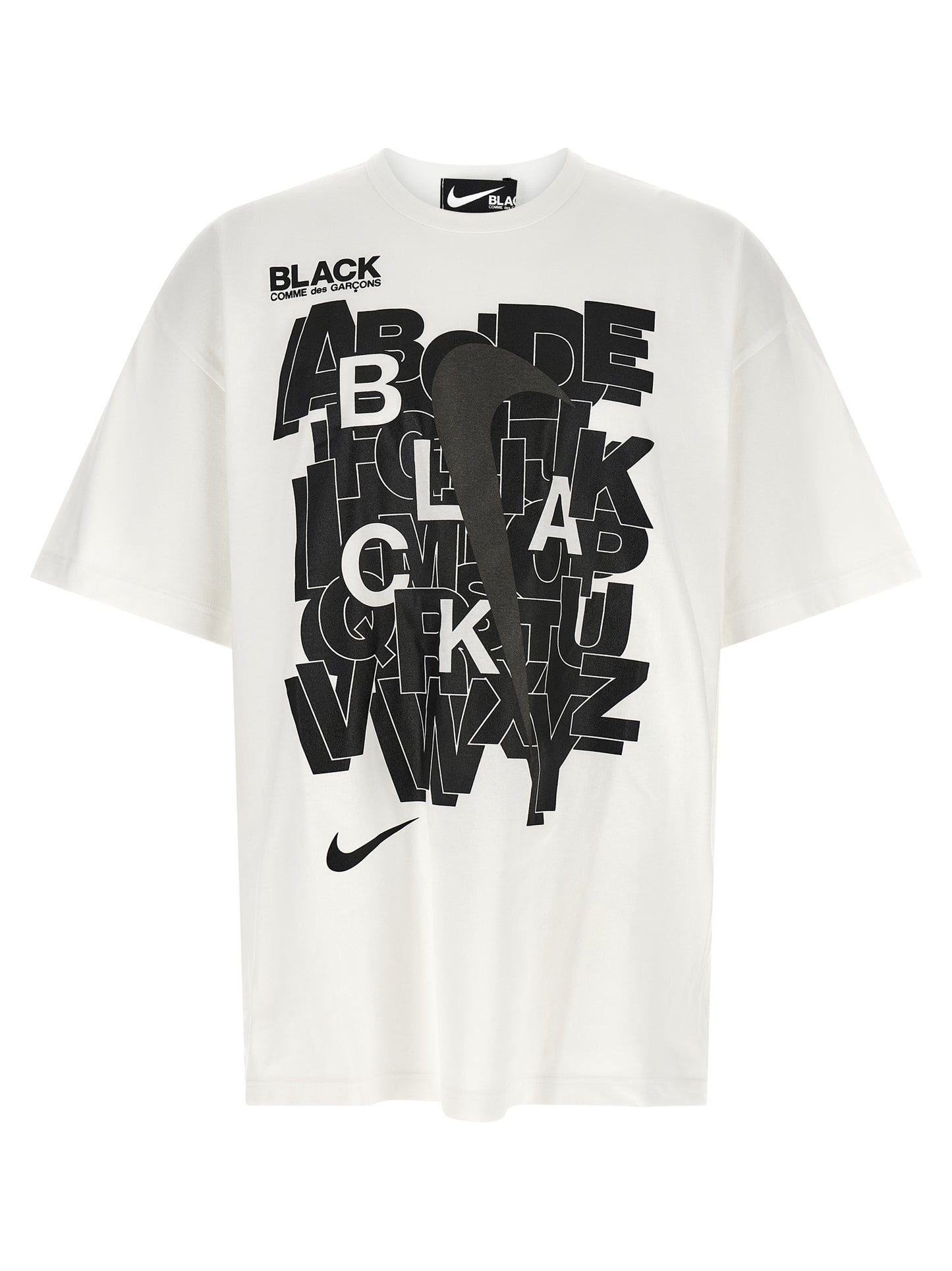 T-Shirt by Comme Des Garçons for men in cotton black, white & print showcases a dramatic silhouette, elegantly detailed with a dramatic crew neckline and for a truly dramatic finish.