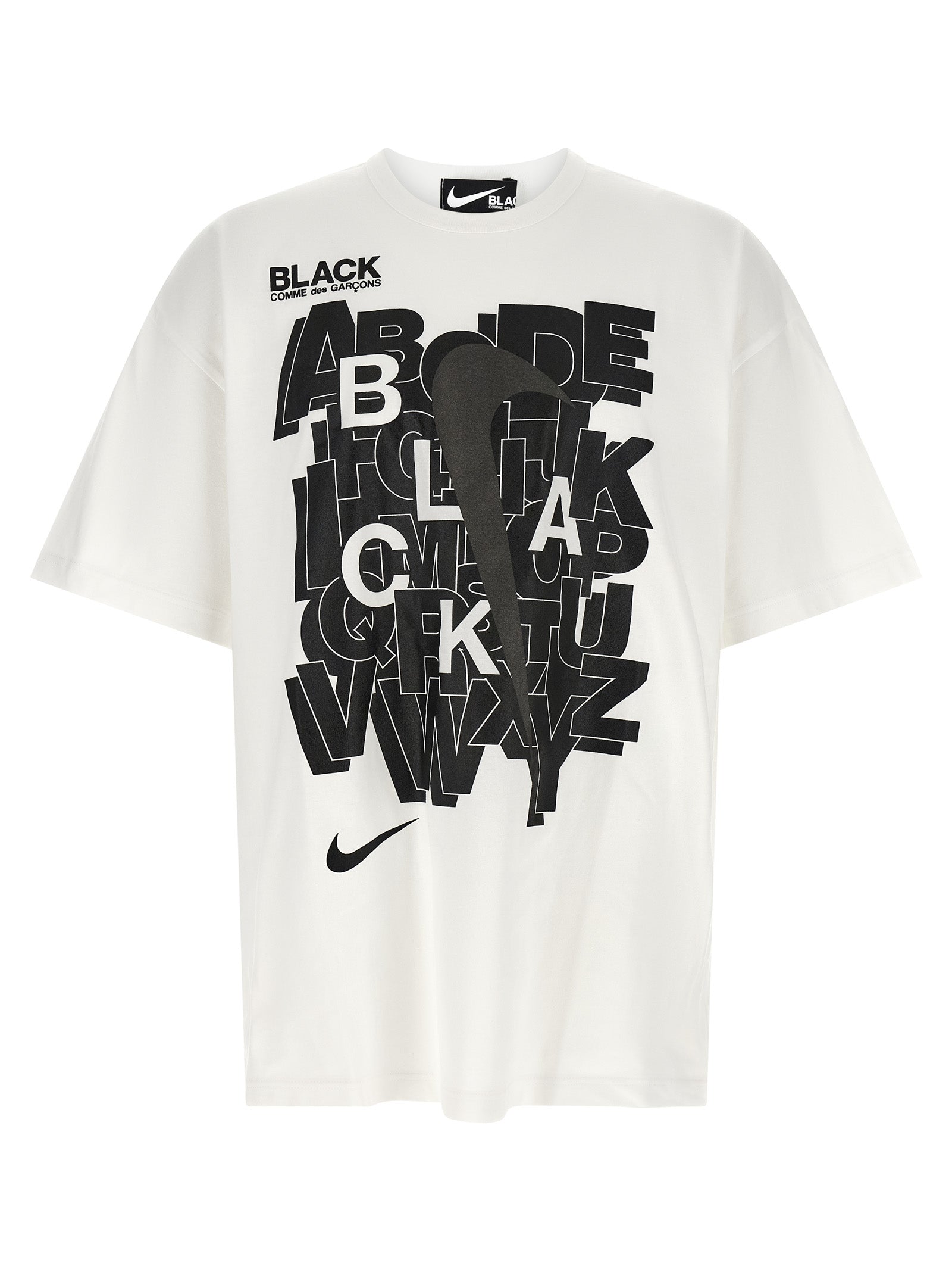 T-Shirt by Comme Des Garçons for men in cotton black, white & print showcases a dramatic silhouette, elegantly detailed with a dramatic crew neckline and for a truly dramatic finish.