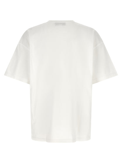 T-Shirt by Comme Des Garçons for men in cotton black, white & print showcases a unassuming silhouette, artfully detailed with a refined crew neckline and unassuming for a sophisticated, contemporary look.