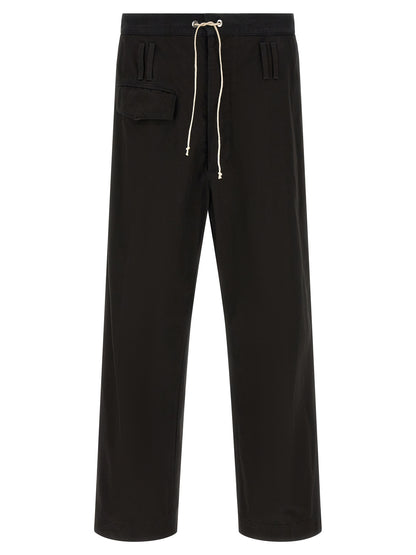 Trousers by Namacheko for men in cotton black & striped features an on trend silhouette, showcasing a sophisticated flared & wide with a long and for an on trend finish.
