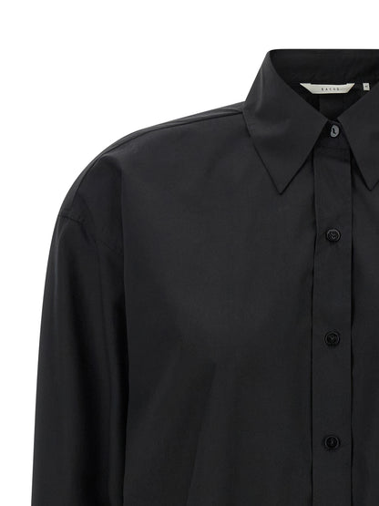 Blouse by XACUS for women in cotton black showcases a sleek silhouette, elegantly detailed with a sleek and for a sleek finish.