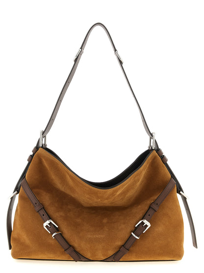 Medium Shoulder Bag by Givenchy for women in calfskin brown showcases a statuesque silhouette, artfully detailed with a secure buckle, organized , and versatile shoulder-strap, adjustable-strap & handle for a statuesque look.