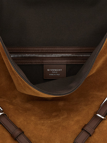 Medium Shoulder Bag by Givenchy for women in calfskin brown features a stately silhouette, showcasing a secure buckle, ample , and stately shoulder-strap, adjustable-strap & handle for a stately finish.