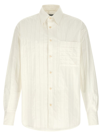 Shirt by Jacquemus for men in cotton horn, white & striped showcases a sharp silhouette, elegantly detailed with a sharp and sharp long-sleeve.