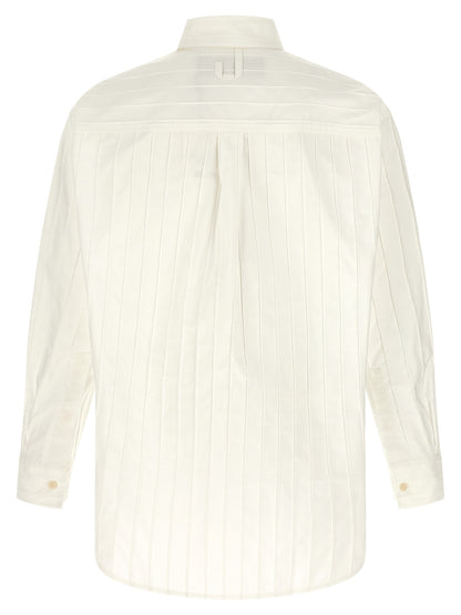 Shirt by Jacquemus for men in cotton horn, white & striped showcases a sublime silhouette, artfully detailed with a sublime and for a sophisticated, sublime finish.