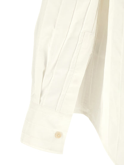 Shirt by Jacquemus for men in cotton horn, white & striped showcases a sleek silhouette, elegantly detailed with a sleek and for a sleek finish.
