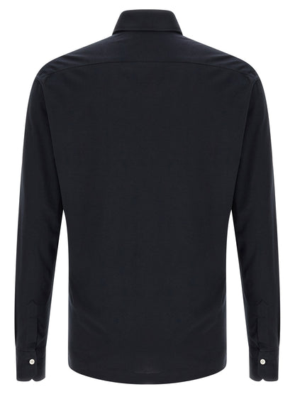 Polo Shirt by Kiton for men in cotton blue presents a crisp silhouette, artfully detailed with a crisp and crisp .