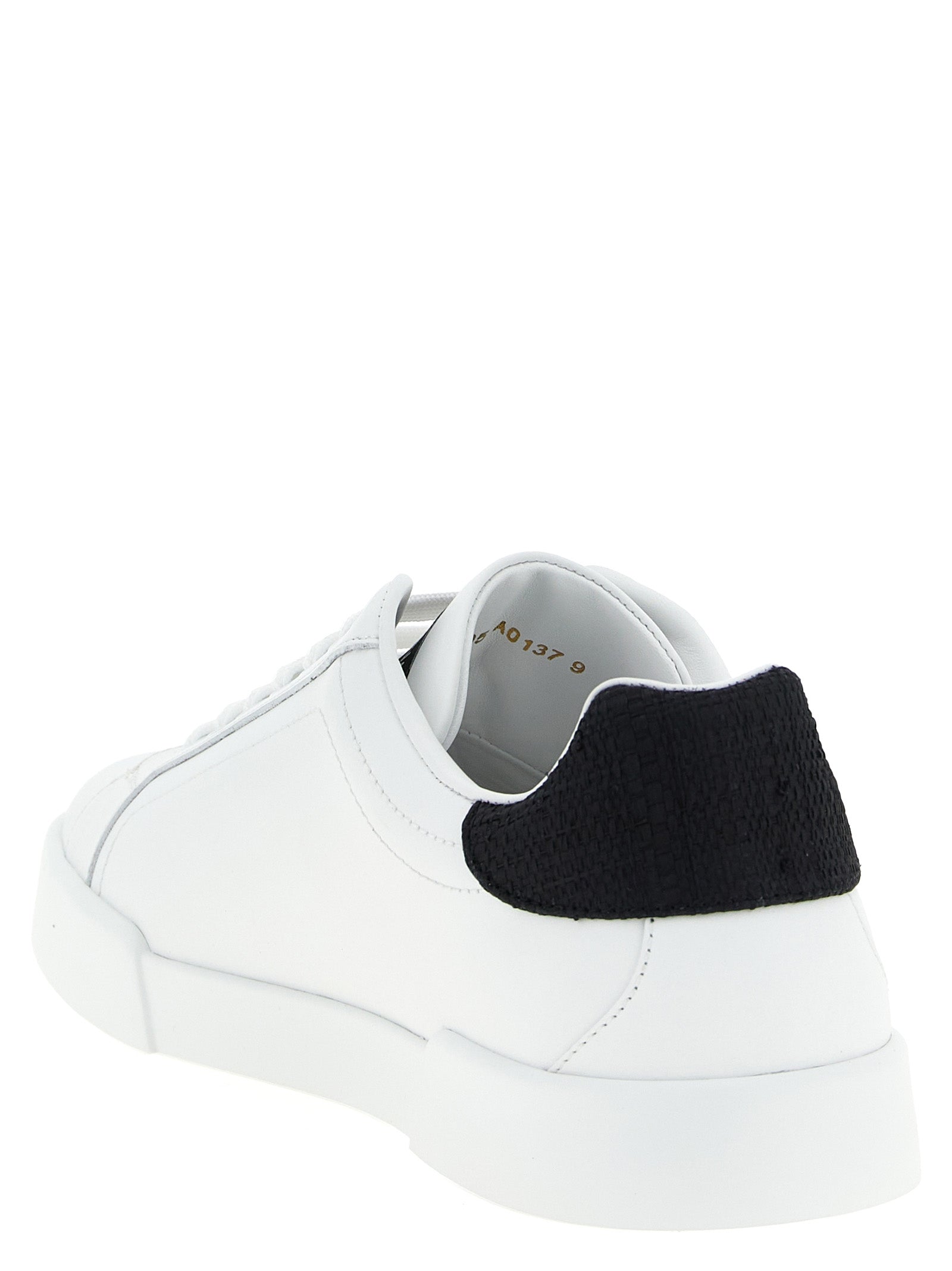 Sneakers by Dolce & Gabbana for men in eva & calfskin leather bicolour, black & white features an fashionable silhouette, showcasing the premium Men's Low Top EVA & Calfskin Leather Sneakers in a fashionable low-top style that offers a fashionable finish for refined style.