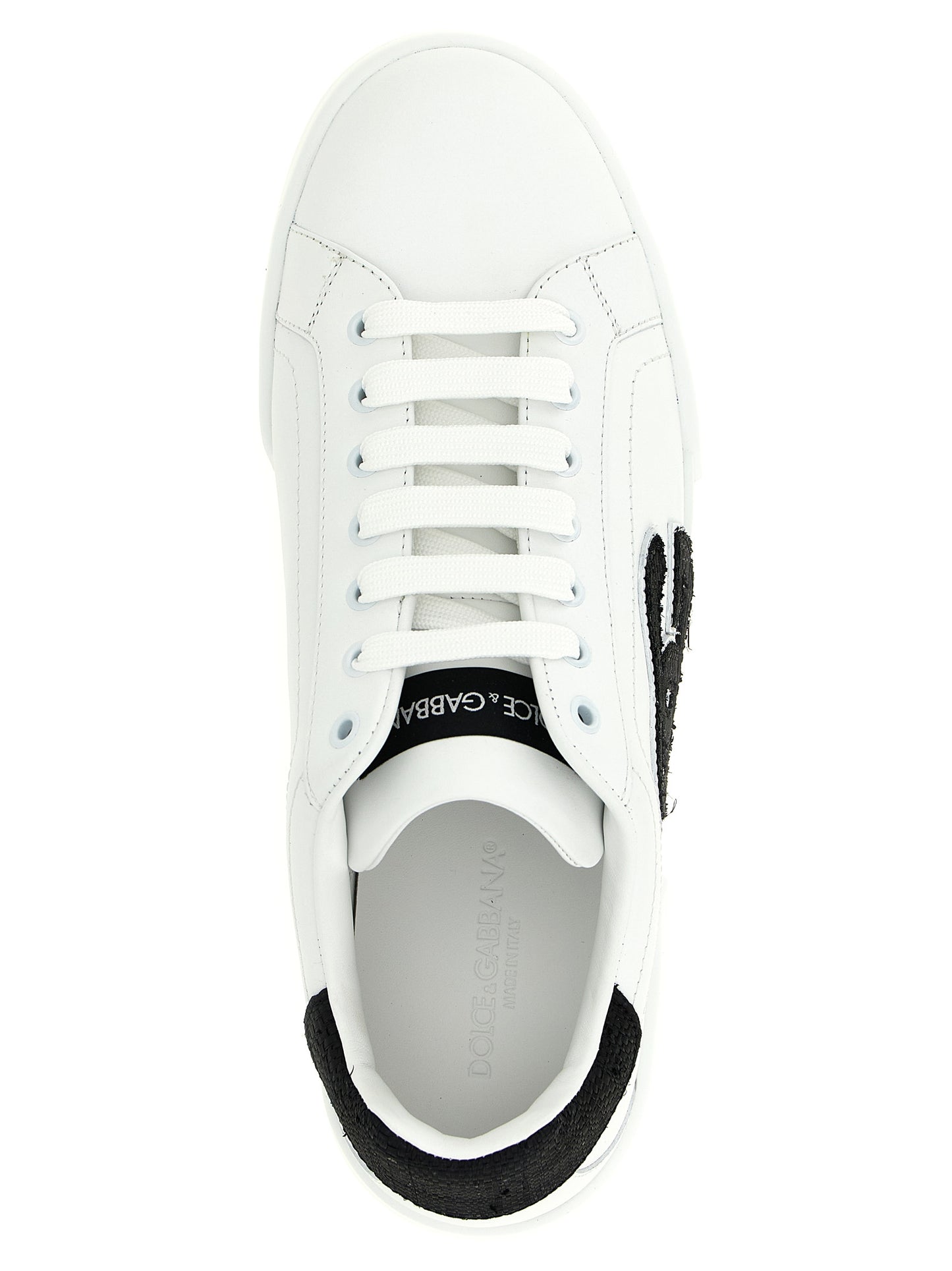 Sneakers by Dolce & Gabbana for men in eva & calfskin leather bicolour, black & white presents a on trend silhouette from the Men's Low Top EVA & Calfskin Leather Sneakers collection, showcasing a on trend low-top style for an elevated aesthetic.