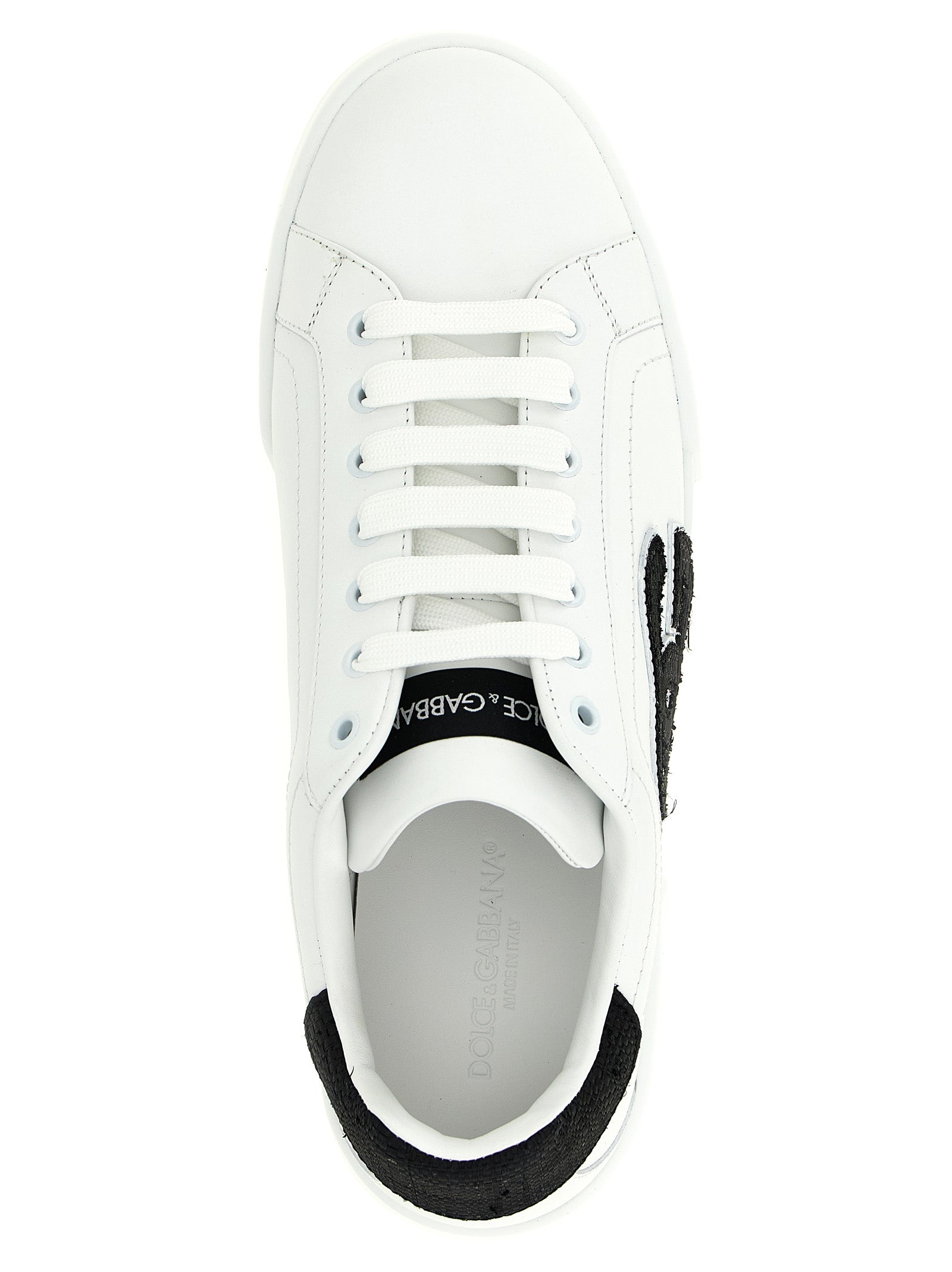 Sneakers by Dolce & Gabbana for men in eva & calfskin leather bicolour, black & white presents a on trend silhouette from the Men's Low Top EVA & Calfskin Leather Sneakers collection, showcasing a on trend low-top style for an elevated aesthetic.