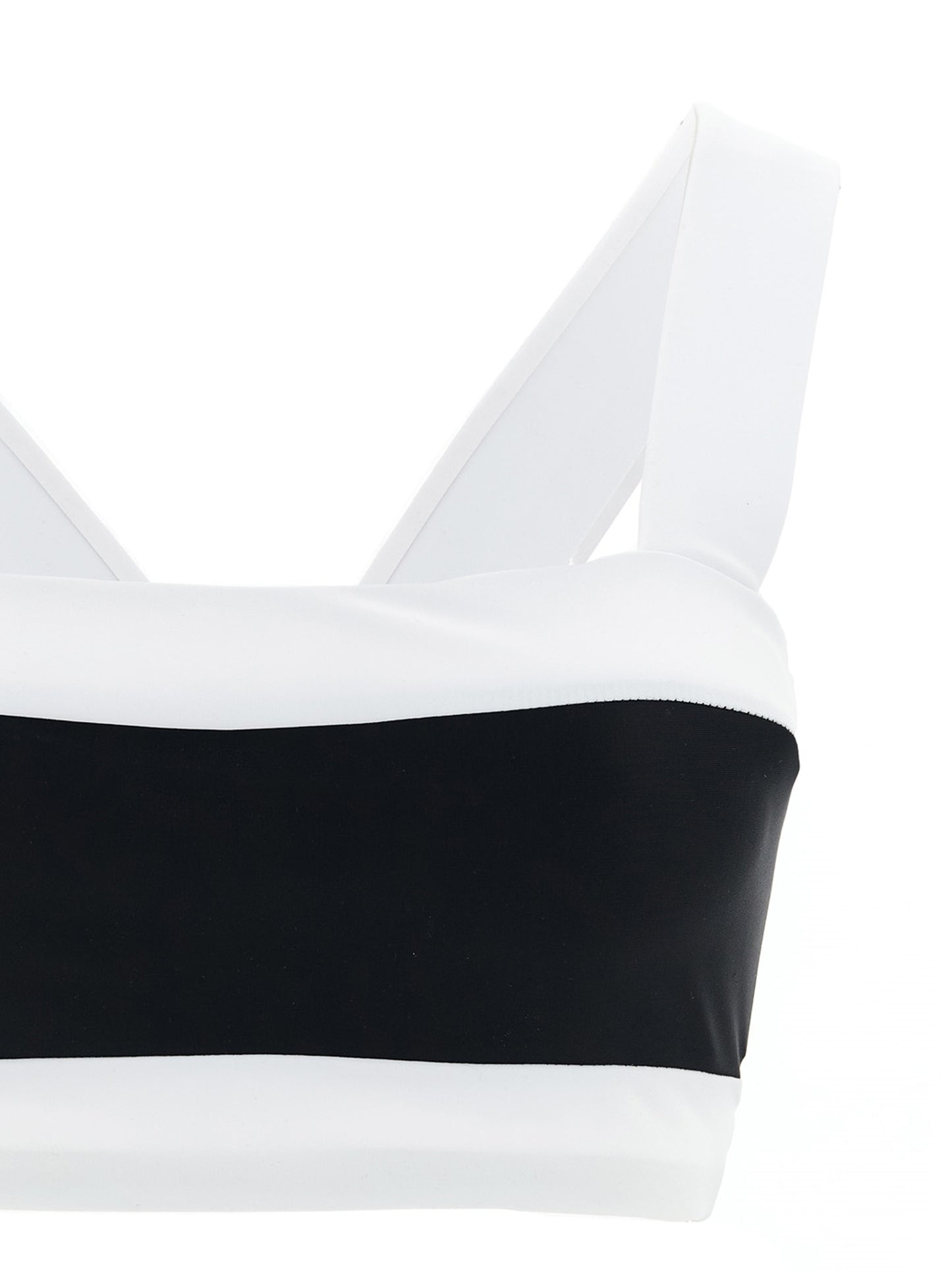 Swimwear Top by GOLDBERGH for women in stretch polyamide bicolour, black & white showcases a contemporary silhouette, artfully capturing the essence of the contemporary Women's Stretch Polyamide Swimwear Top design for a sophisticated look.