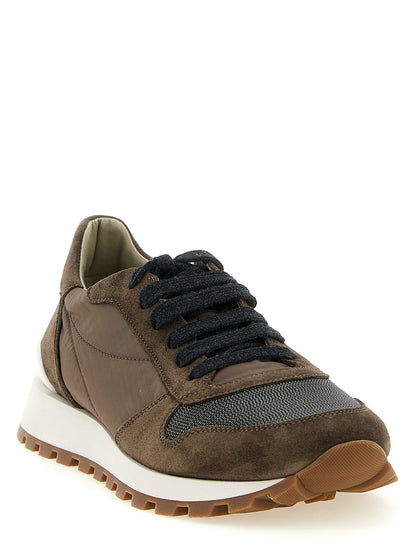Athletic Sneakers by Brunello Cucinelli for women in bos taurus calfskin suede leather & tu bicolour & green showcases an impeccable silhouette, defined by an impeccable athletic style design that perfectly captures the essence of the Women's Athletic Bos Taurus Calfskin Suede Leather & TU Sneakers.